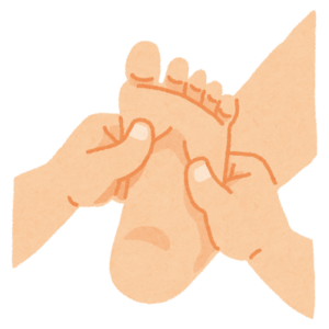 足つぼをマッサージする様子