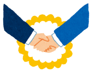 固い握手を交わすスーツ姿の二人