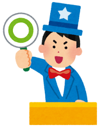 クイズ大会で〇印を掲げる司会者の男性