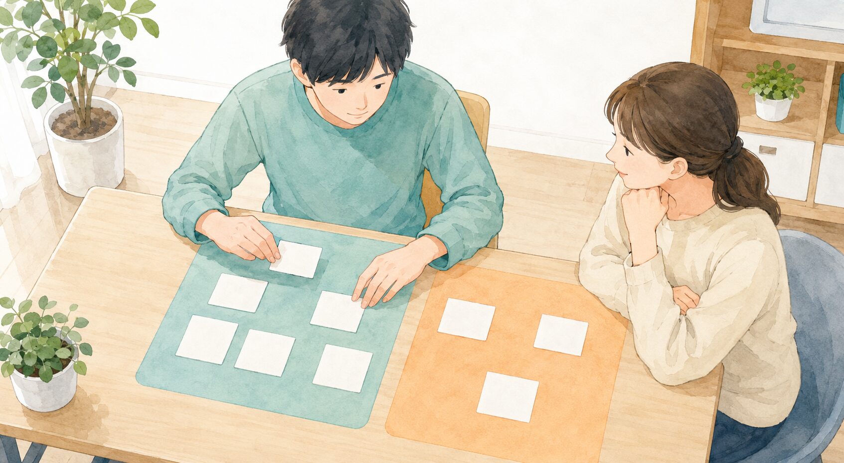 作業カードを二つの領域へ分け、支援者と確認する場面